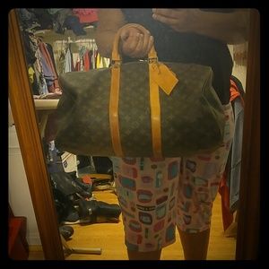 A large vintage carry on Louis Vuitton  NO BUNDLE